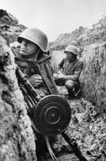 Soviet troops in a trench in Leningrad, Russia, 1 Sep 1941; note DP machine gun