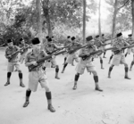 Men of the British Malay Regiment performing bayonet practice, Singapore, Oct 1941