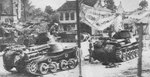 Japanese Type 95 and Type 97 tanks in a town in Malaya, circa Dec 1941-Feb 1942