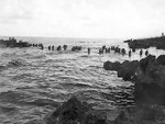 American reinforcements wading onto Tinian, Mariana Islands, Jul 1944