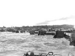 Amtracs moving onto Tinian beach, Mariana Islands, Jul 1944