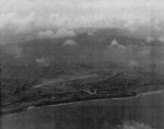 TBF aircraft from USS Coral Sea flying over Aslito Airfield, Saipan, Mariana Islands, 20 Jun 1944