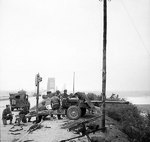 17-pdr anti-tank gun of the 21st Anti-Tank Regiment, British Guards Armoured Division, guarding the approaches to Nijmegen Bridge, the Netherlands, 21 Sep 1944