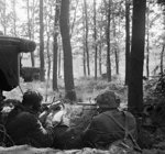 Two British airborne troops dug in at their brigade headquarters near Arnhem, Gelderland, the Netherlands, 18 Sep 1944