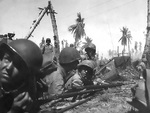 Men of the US Marine Corps 22nd Regiment taking position on Eniwetok, Marshall Islands, 17-21 Feb 1944