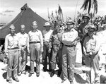 Spruance, Conolly, Forrestal, Schmidt, Smith, Moreel, Carlson, and Pownall at Kwajalein Atoll, Feb 1944, photo 1 of 2