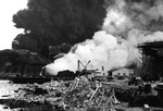 Burning ship and oil storage at Dutch Harbor, US Territory of Alaska, 4 Jun 1942, photo 1 of 2