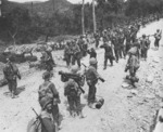 US troops and German prisoners of war near Itri, Italy, 1944