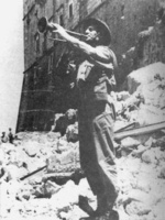 Polish bugler Master Corporal Emil Czech playing the Hejnał mariacki, announcing the victory at Monte Cassino, Italy, 18 May 1944