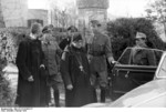 German General Fridolin von Senger und Etterlin (right, holding door) with Italian priest Gregorio Diamare of the Monte Cassino abbey, Italy, Feb 1944