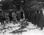 Soviet officers inspecting captured German troops and weapons, near Moscow, Russia, 20 Dec 1941