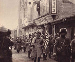 Japanese troops marching into an identified town, northeastern China, circa Sep-Oct 1931