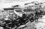 Dead Chinese piled on the shore of the Yangtze River near Xiaguan Pier, Nanjing, China, Dec 1937