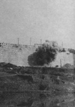 Japanese artillery bombarding the Nanjing city wall, China, circa 12 Dec 1937