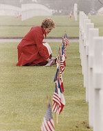 Mrs. Nancy Reagan laying flowers at the Omaha Beach Memorial Cemetery, Normandy, France, 11 Jun 1982