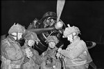 British Pathfinders synchronizing their watches in front of an Armstrong Whitworth Albemarle aircraft, 5 Jun 1944