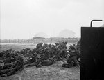 Men of the British 2nd Army waiting to move off Queen White Beach of Sword Beach, Normandy, France, 6 Jun 1944