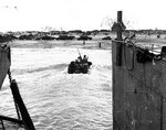 US Army weapons carrier moved through the surf toward Utah Beach, Normandy, after being launched from its landing craft, 6 Jun 1944