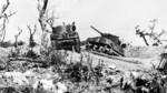 Two wrecked M4 Sherman tanks at Bloody Ridge, destroyed by Japanese artillery, Okinawa, Japan, 20 Apr 1945