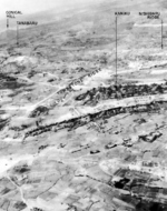 Aerial view of Tombstone Ridge area, Okinawa, Japan, 10 Jul 1945