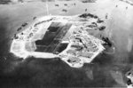 Ford Island, Pearl Harbor, Oahu, US Territory of Hawaii, Oct 10, 1941. Carrier Enterprise and Repair Ship Curtiss are moored alonfside Ford Island on the right of the photograph.