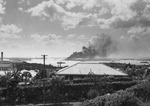 USS Arizona and other Pearl Harbor ships burning in the distance, photo taken from Aeia Heights, Oahu, US Territory of Hawaii, 7 Dec 1941