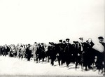 Polish policemen and civilians, captured by Russian troops, marching in a column, Sep 1939