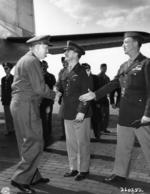General George Marshall greeting Major General John Deane (shaking hands) and Brigadier General Stuart Culter (approaching), Berlin, Germany, 15 Jul 1945