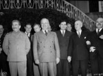Harry Vaughan, Joseph Stalin, Harry Truman, Andrei Gromyko, Charles Ross, James Byrnes, and Vyacheslav Molotov at Stalin
