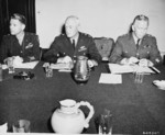 Major General Lauris Norstad, General Henry Arnold, and General George Marshall at a meeting during the Potsdam Conference, Germany, 21 Jul 1945