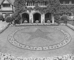 Courtyard of Cecilienhof Palace, Potsdam, Germany, 13 Jul 1945; note star formed by red begonias