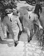 US Navy Fleet Admiral Ernest J. King and Commander R. E. Dornin climbing the steps to their quarters during Potsdam Conference, Germany, 15 Jul 1945