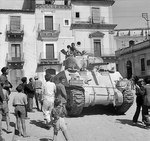 British Sherman tank of XIII Corps, Eighth Army in the streets of Francofonte, Sicily, 13-14 Jul 1943