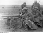 Spanish Nationalist field gun crew, the Battle of Guadalajara, Spain, Mar 1937, photo 1 of 2