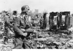 German Air Force troops securing areas recently overran by Army troops, Stalingrad, Russia, 22 Oct 1942; ntoe MP 40 submachine gun