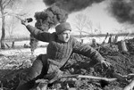 Soviet soldier throwing a grenade near Stalingrad, Russia, 1942