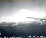 Japanese ammunition ships in Truk Harbor being attacked by dive bombers of USS Intrepid, Caroline Islands, 17 Feb 1944