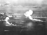 Japanese ships and fishing boats under attack at Dublon Island, Truk Atoll, Caroline Islands, 16 Feb 1944