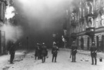 SS troops observing the block of Nowolipie Street between Smocza and Karmelicka Streets burning, Warsaw, Poland, Apr-May 1943