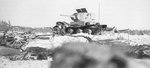 Destroyed Russian T-26 light tank, Finland, 13 Feb 1940