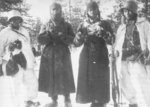 Finnish soldiers guarding two Soviet prisoners of war, Finland, 1939-1940