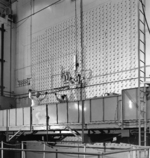 Workers loading uranium slugs into the X-10 Graphite Reactor