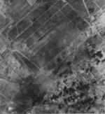 Kagi Airfield under B-29 bomber attack, southern Taiwan, 14 Jan 1945, photo 3 of 3