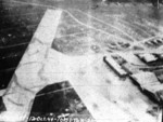 Matsuyama Airfield, Taihoku (now Taipei), Taiwan under attack by aircraft from USS Bunker Hill, 12 Oct 1944, photo 1 of 3