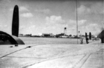 View of Sand Island, Midway Atoll from a PB2Y-5 Coronado aircraft in the submarine basin, circa early 1944