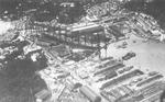 Aerial view of Yokosuka Naval Arsenal several days after the Great Kanto Earthquake of 1923, 3 or 4 Sep 1923; note battlecruiser Amagi in drydock