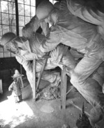 Sculptor Felix de Weldon working on the plaster model of the US Marine Corps War Memorial, circa 1954, photo 2 of 7