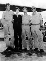 USAAF 3rd Bomb Group photographer Jack Heyn, actress Una Merkel, and two 2nd Bomb Command cinematographers at Dobodura Airfield, Australian Papua, mid-1943