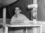 USAAF 3rd Bomb Group photographer Norm Nelson in his tent, Nadzab Airfield, Australian New Guinea, early 1944