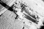 Carrier aircraft of Task Force 38 attacking the Japanese Army airfield at Takao (now Kaohsiung), Taiwan, 12 Oct 1944, photo 4 of 4; US intelligence referred to this field as 